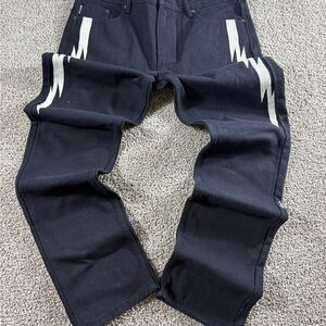 Stylish Black Jeans with White Accents